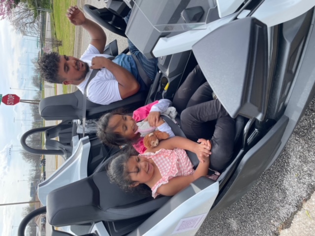 Evelyn sitting in Slingshot