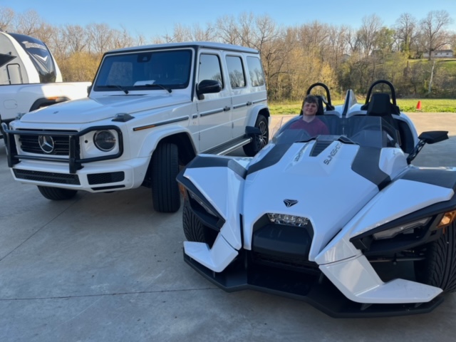 A man riding in the Slingshot